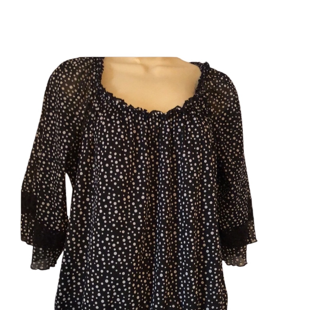 Woman’s black & white polkadot fall ruffles feminine blouse